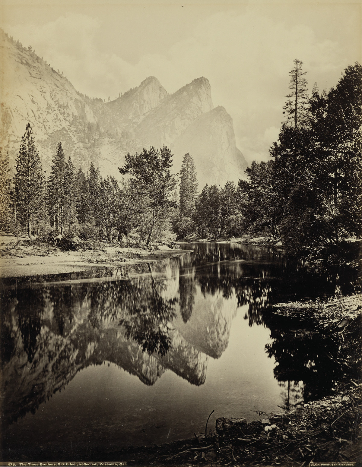 CARLETON E. WATKINS (1829-1916)/ISAIAH TABER (1830-1912) The Three Brothers, 3,818 feet, reflected, Yosemite, California.